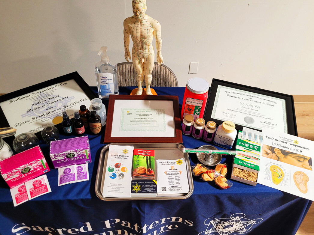 Sacred Patterns Acupuncture Table Display - Resonant Essentials Psychic Healing Fair - July 2024 - Albuquerque, NM