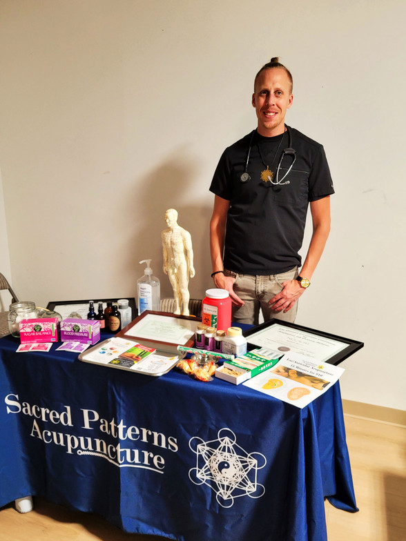 Sacred Patterns Acupuncture Table Display - Resonant Essentials Psychic Healing Fair - July 2024 - Albuquerque, NM