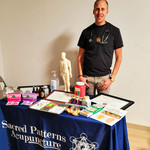 Sacred Patterns Acupuncture Table Display - Resonant Essentials Psychic Healing Fair - July 2024 - Albuquerque, NM