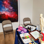 Sacred Patterns Acupuncture Table Display - Resonant Essentials Psychic Healing Fair - July 2024 - Albuquerque, NM